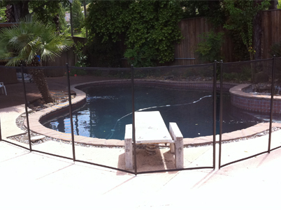 black Visi Guard mesh pool fence